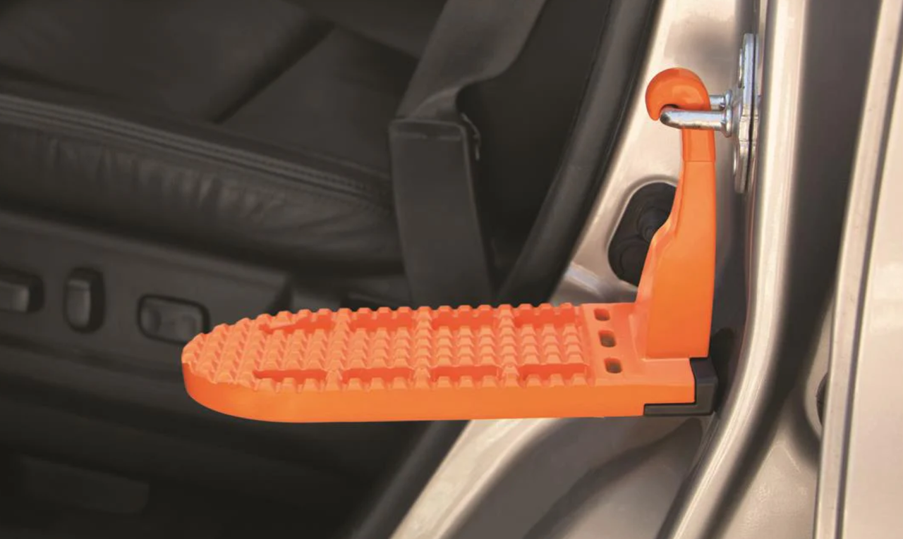 A photo of a car door latch step